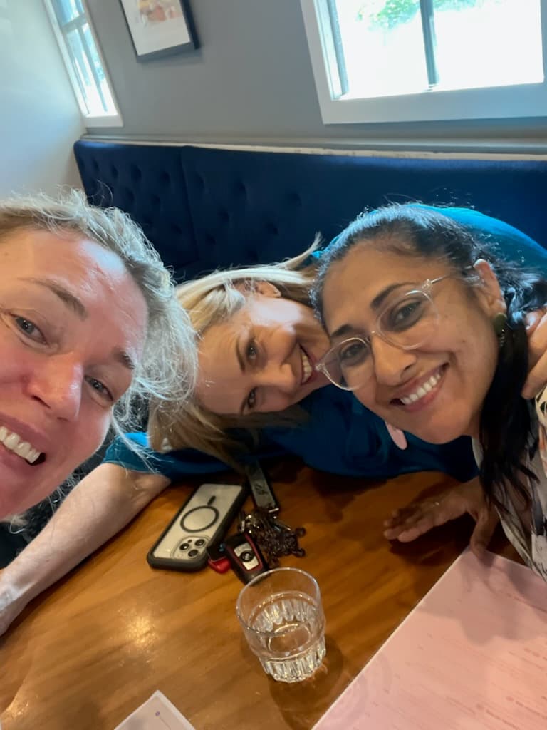 Three Second 50 Life Design Trio members smiling together.